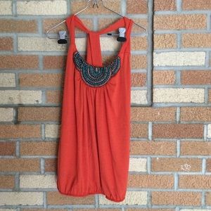 Orange beaded blouse